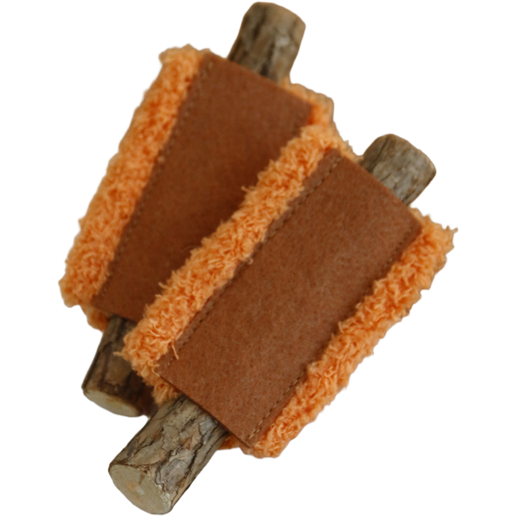Close view of Orange cat toys with brown stitched panels and curly borders