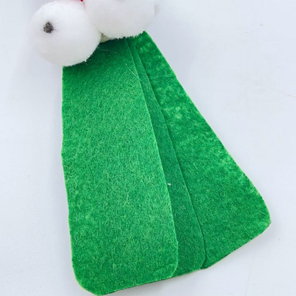 Close-up of the scallion-shaped cat toy's overlapping green leaf surfaces and rounded edges