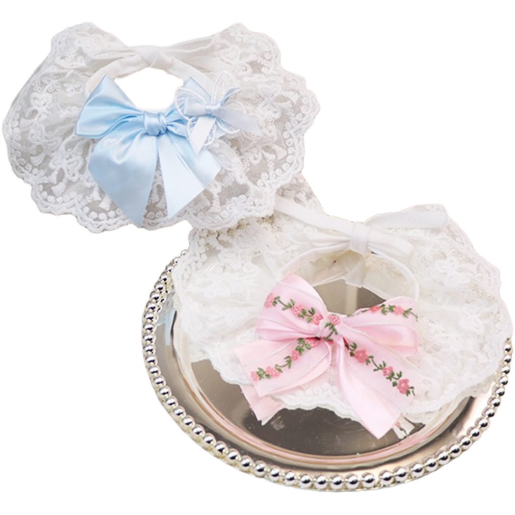 Blue and Pink Pet Neckwear displayed together with layered and floral bow details