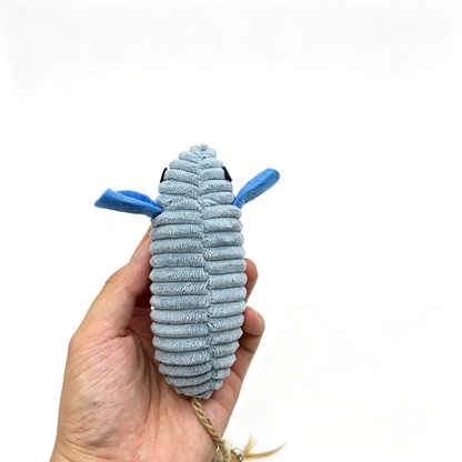 Hand holding a ribbed mouse cat toy, showing its surface and blue fabric details close up