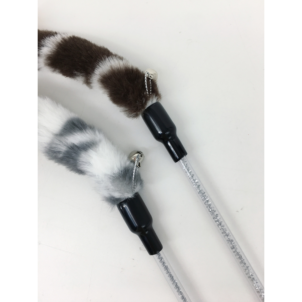 Close-up of two cat teaser wand connectors