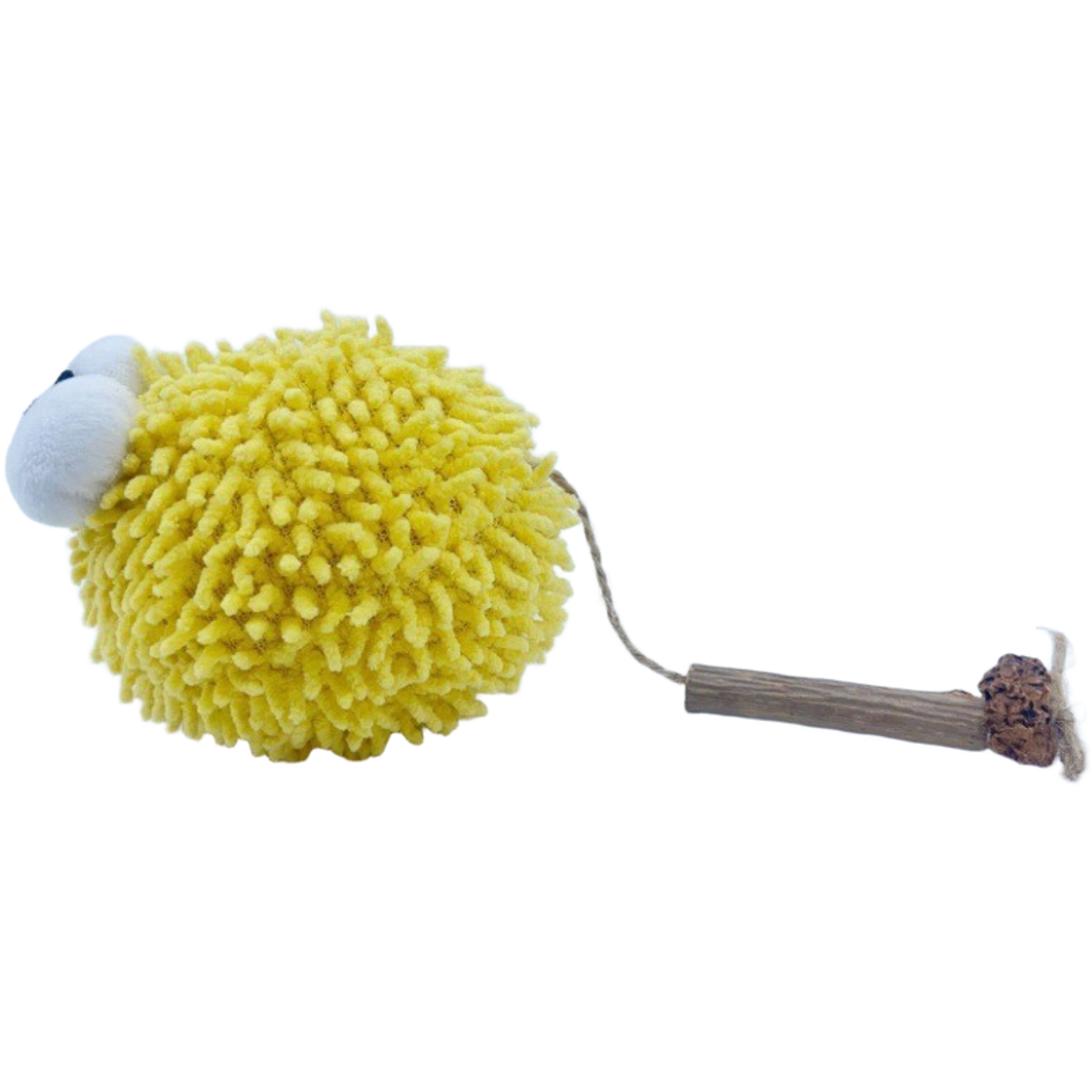 Ball cat toy with a shaggy yellow body, white eyes and a cord attached to a stick with a brown end piece
