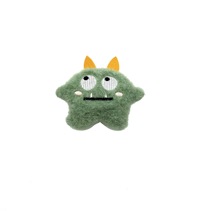 Green Two-eyed plush cat toy with yellow pointed appendages and a stitched face, front view