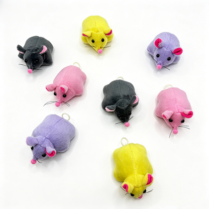 Gray, Pink, Yellow and Purple mouse cat toys viewed from above