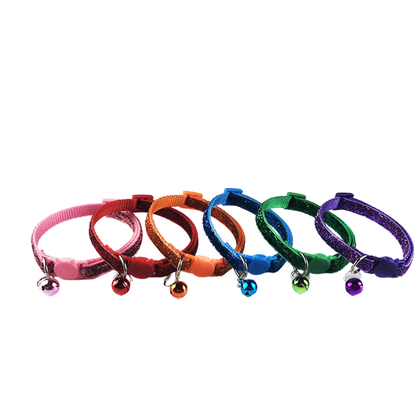 Six glittery cat collar colors arranged in a row with cat-face buckles and bells