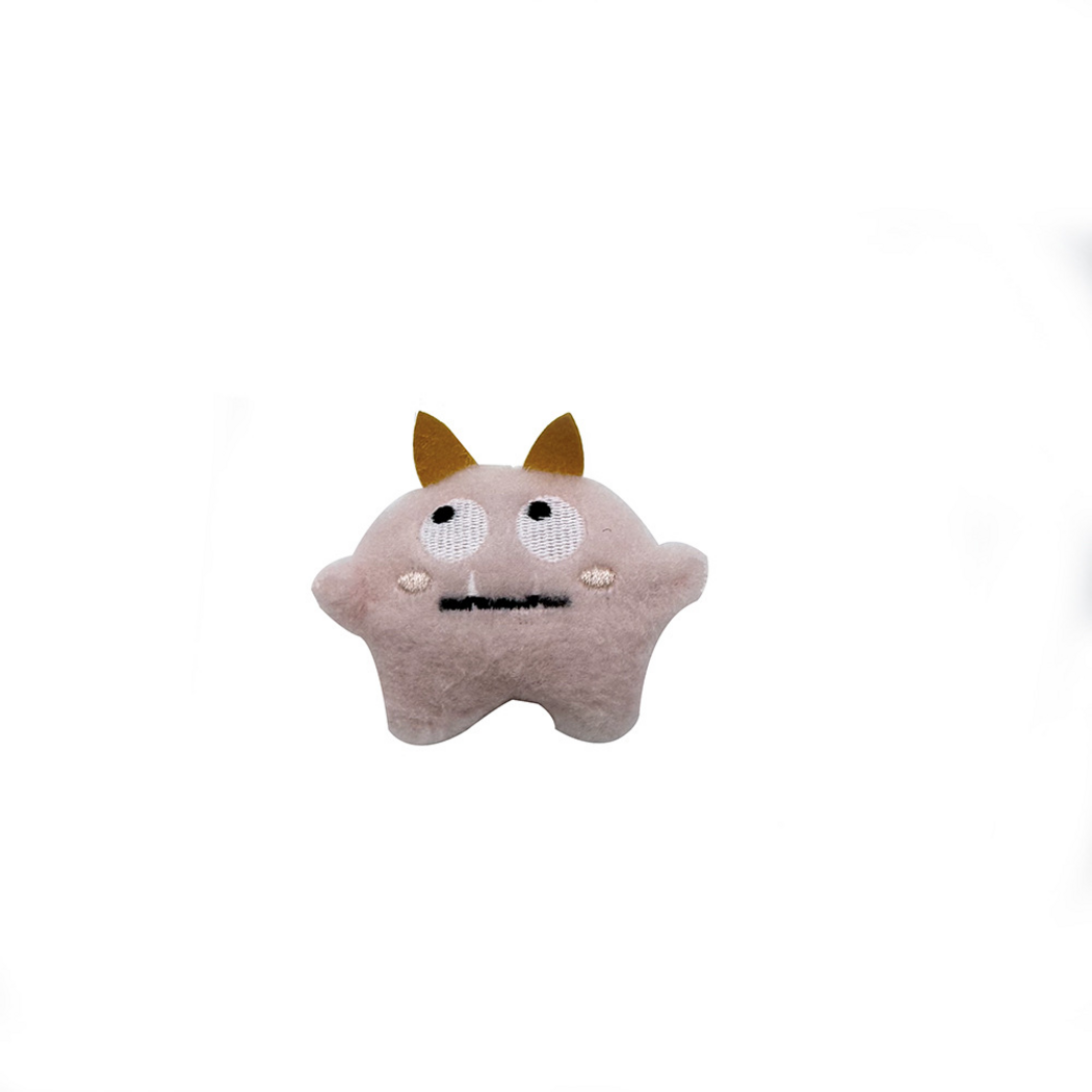Pink Two-eyed plush cat toy with yellow pointed appendages and a stitched face, front view