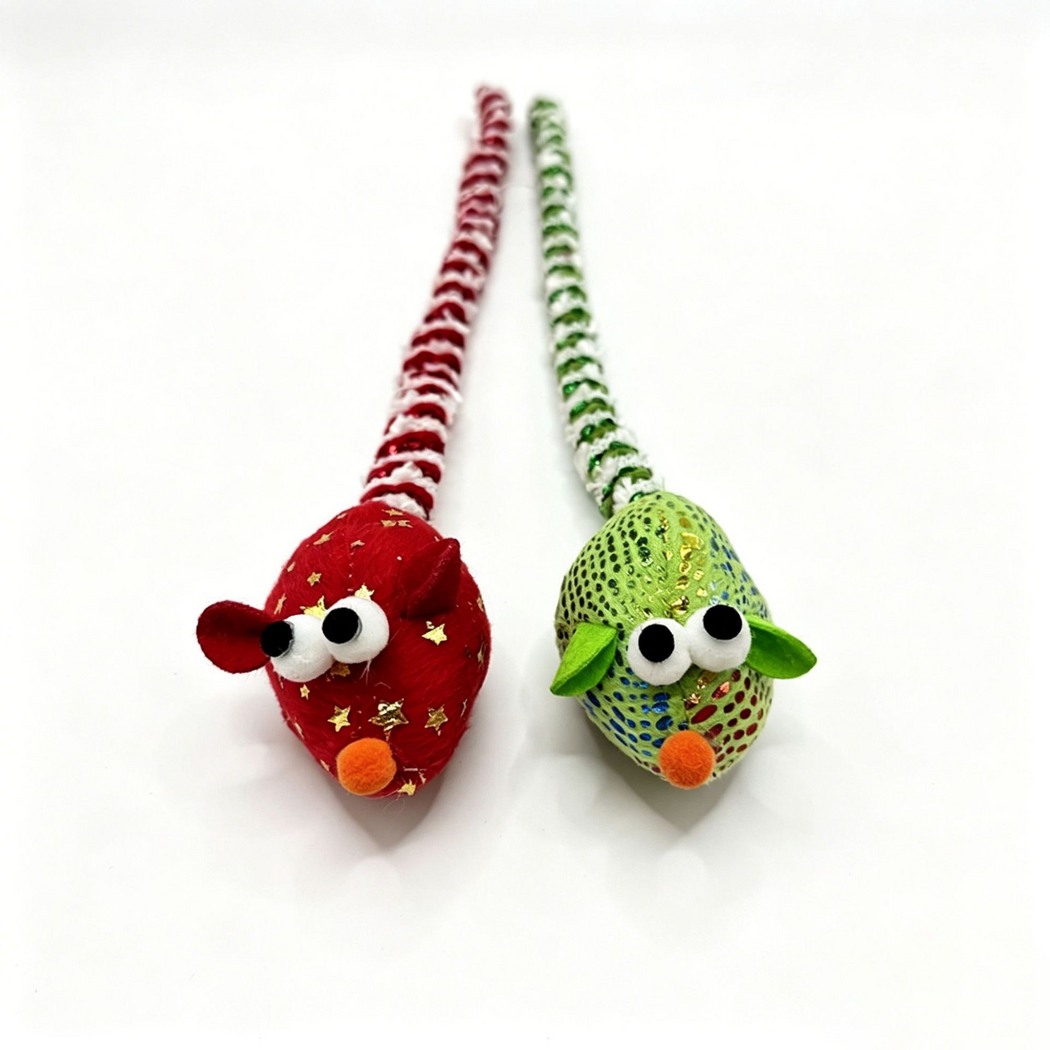 Close view of Red and Green mouse cat toys showing projecting eyes, ears and orange noses