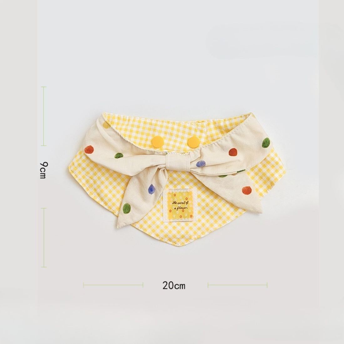 Close-up of Mokka Colour Spot Cat Neck Bib fabric texture and spot pattern