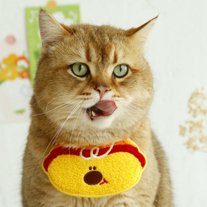 Close-up of cat's neck wearing Mokka cartoon bib collar with cartoon graphics