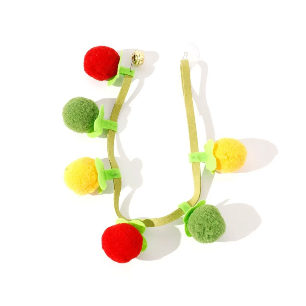 Colorful beads on the Moo Garden Beads Wand Cat Toy against white background