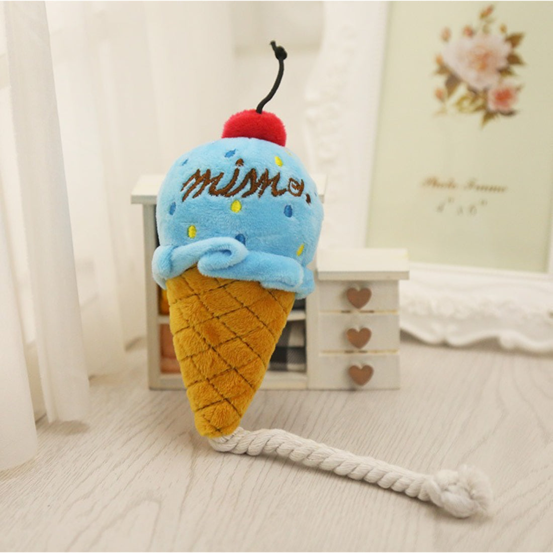 Petkin Ice Cream Plush Rope Dog Toy with pink and white plush ice cream top and twisted rope base
