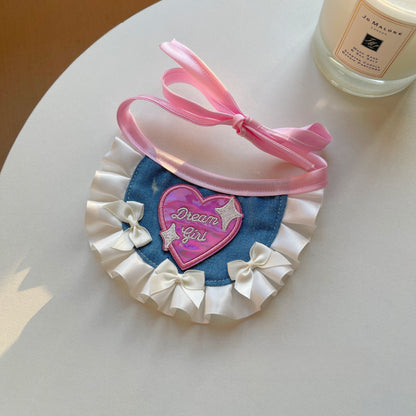 Mokka denim lace bow pet bandana worn by a small dog