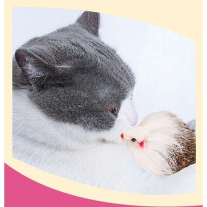 Moo faux fur mouse cat toy displayed next to a cat paw for size comparison