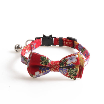 Close-up of Mokka Japanese-style bow tie cat collar showing fabric texture