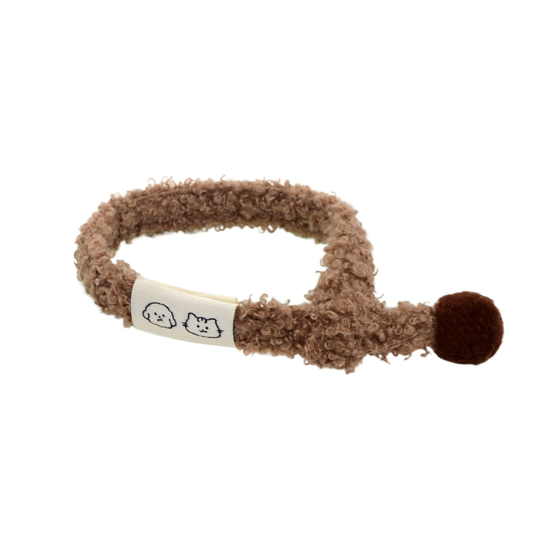 Mokka soft pom pom cat collar worn by a cat, showing fit and style