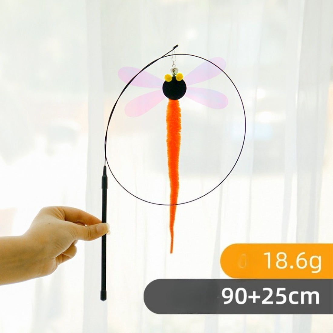 Moo Dragonfly Teaser Cat Wand Toy with dragonfly teaser in focus on a plain background