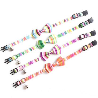 Mokka cat collar with rainbow striped bow tie displayed flat on surface