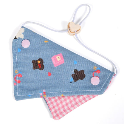 Mokka cartoon print cat bandana collar displayed with focus on fabric pattern