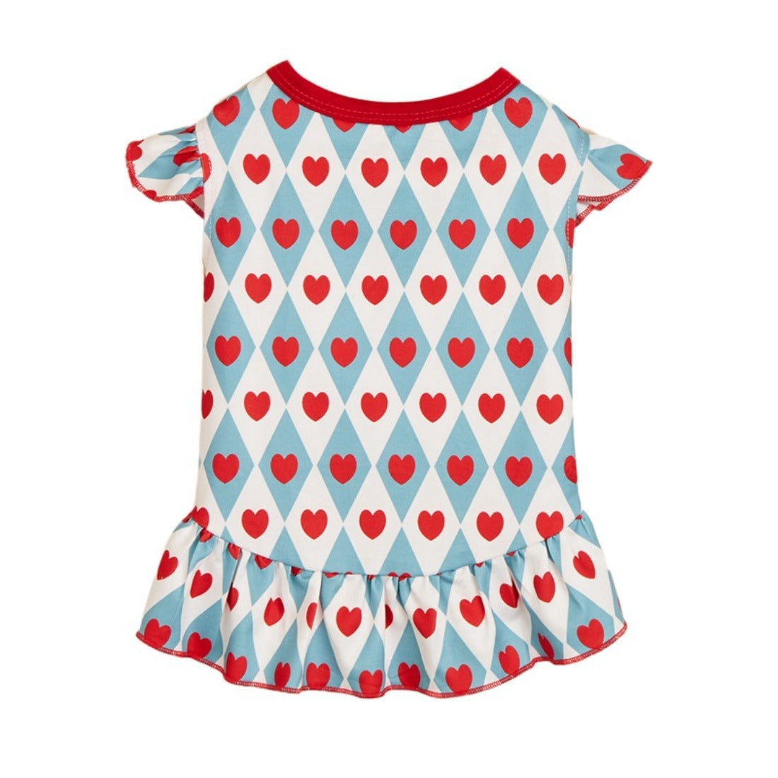 Close-up of Ozzie dog dress with red hearts on white fabric on small dog