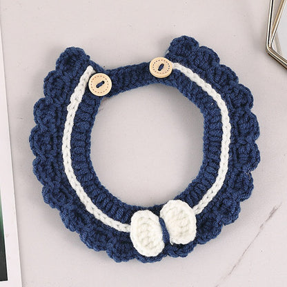 Mokka button crochet cat collar coiled with visible button and bell