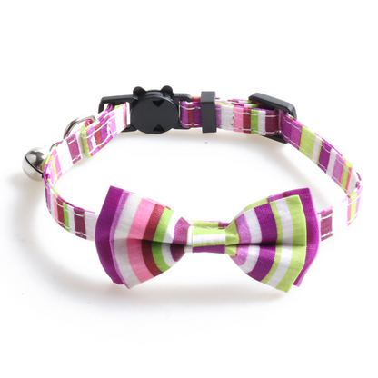 Mokka adjustable cat collar with vibrant rainbow stripe bow tie on black background