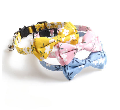 Mokka floral cat collar with bow tie displayed on white background