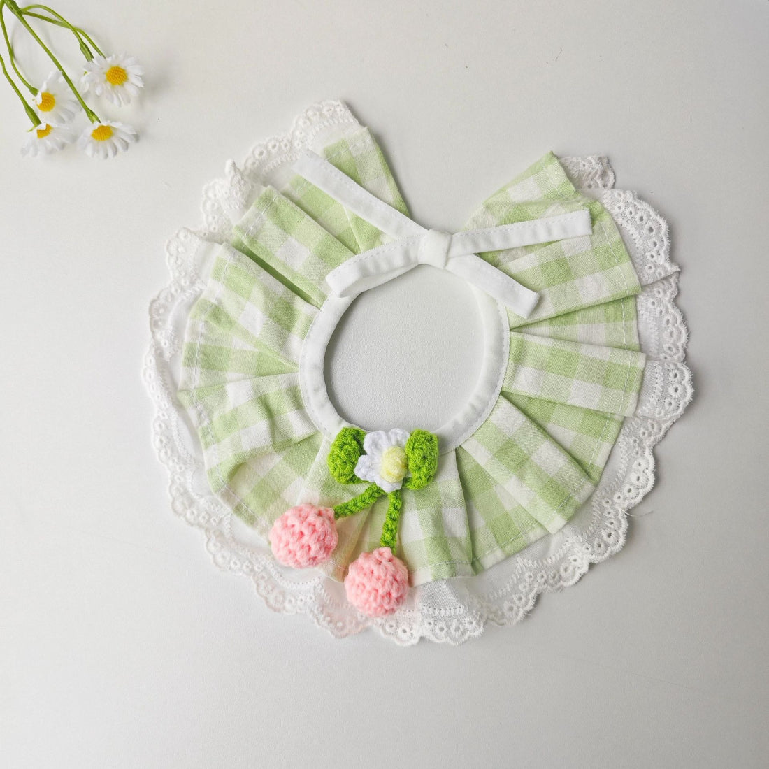 Mokka gingham cherry cat collar displayed on white background showing pattern and hardware