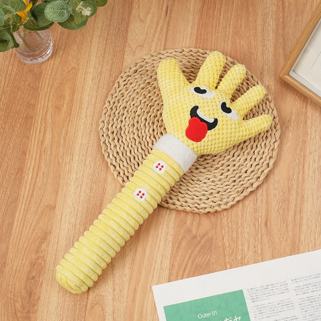 Petkin squeaky plush dog toy shaped like a colorful animal with stitched details