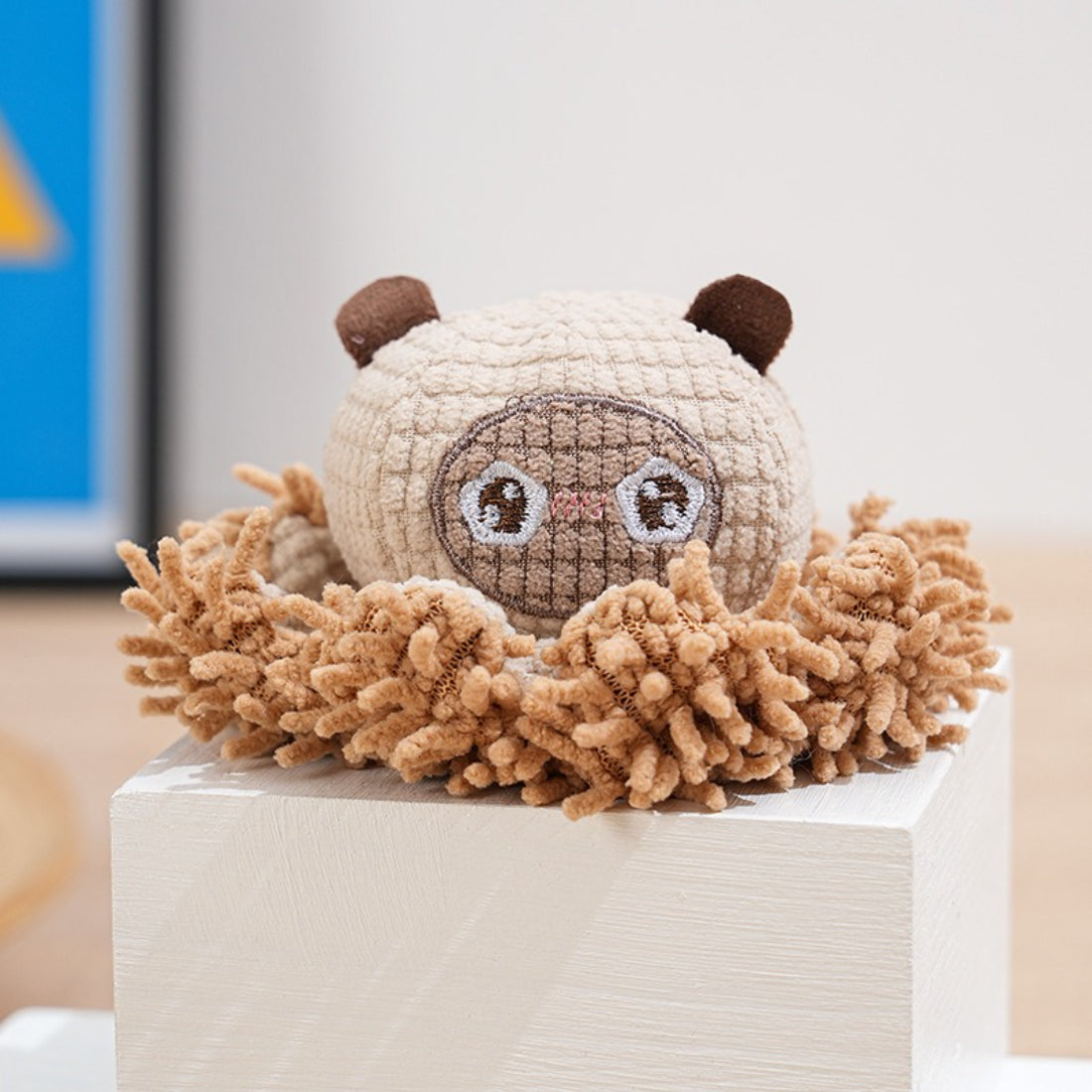Side view of Petkin frog squeaky dog toy highlighting stitched details