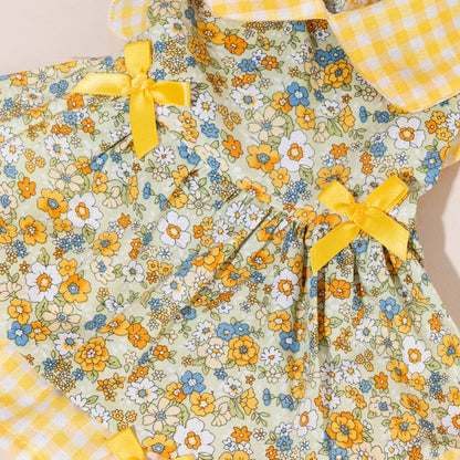 Ozzie dog dress floral fabric and pink bow detail on small dog