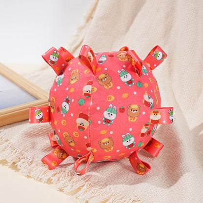 Petkin Loop Ball Tug Dog Toy held by a person ready for play