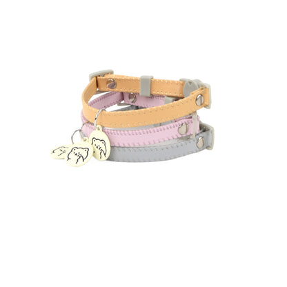 Mokka cartoon charm breakaway cat collar with colorful cat face design on pink background