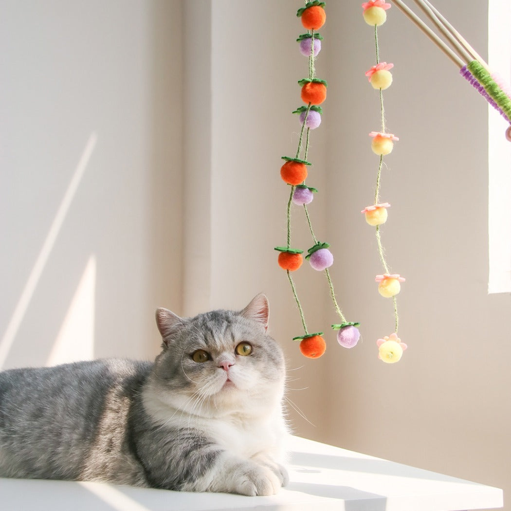 Moo Hanging Pom Wand interactive cat toy with colorful pom poms on a stick