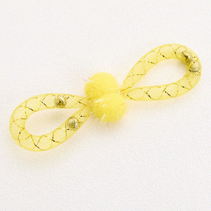 Moo cat toy with colorful pom-pom and white mesh body isolated on a white background