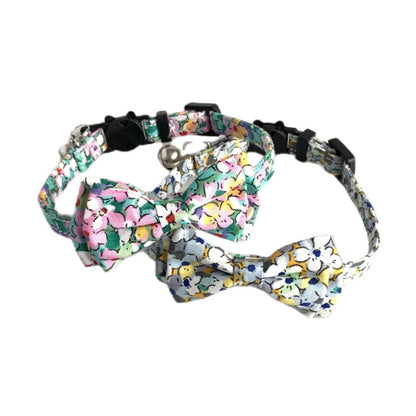 Mokka floral bow tie cat collar with bell in natural lighting