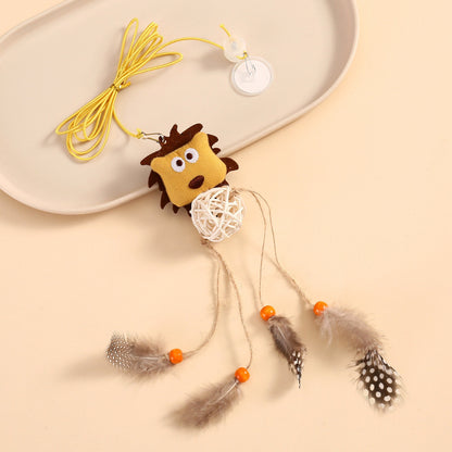Close-up of plush lion head on hanging cat toy with detailed facial features