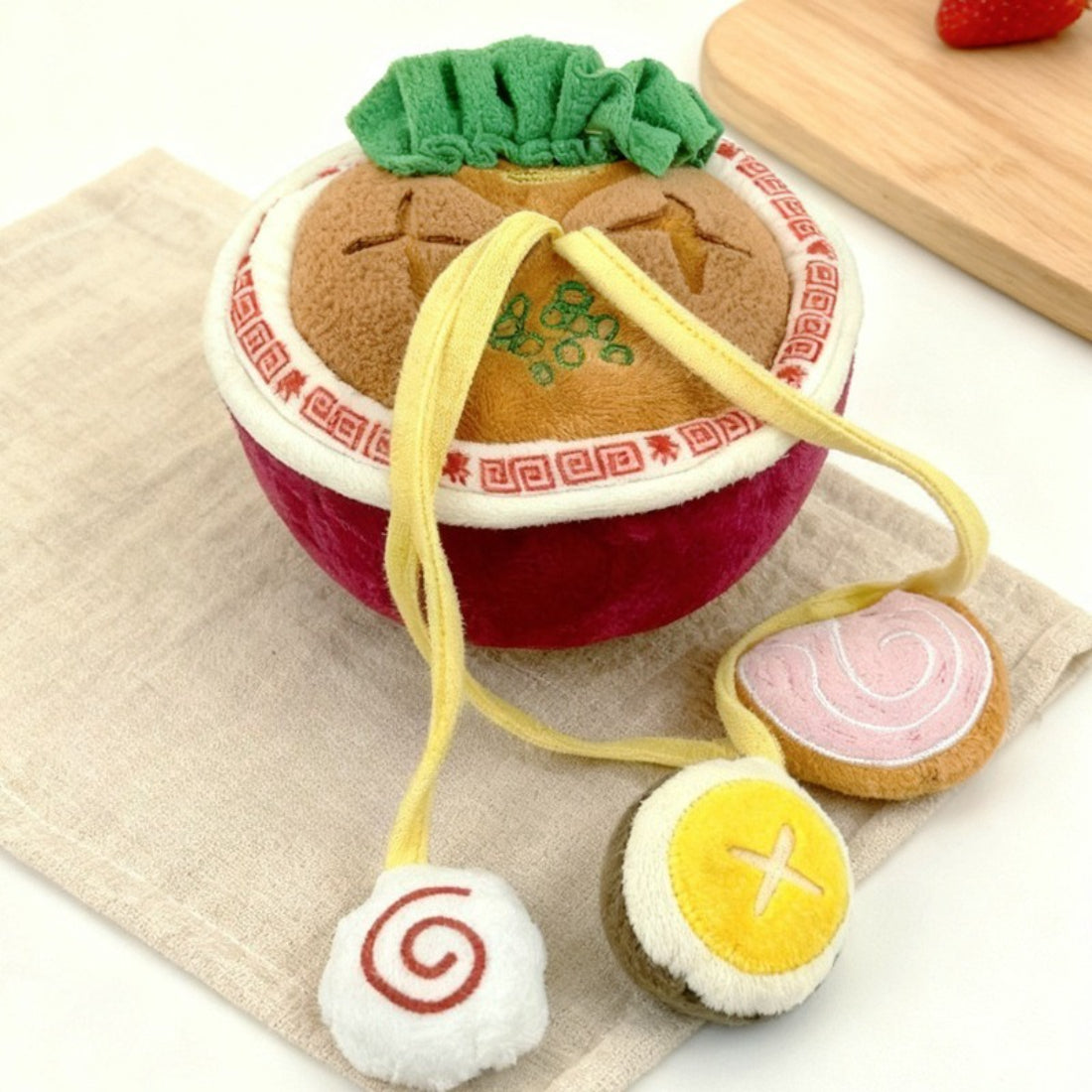 Top view of Snuffy Ramen Snuffle Puzzle Dog Toy with layered noodle fabric design