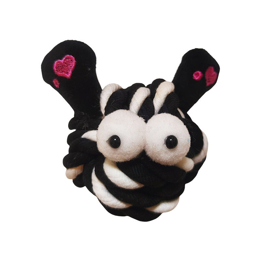 Heart Flower plush dog toy with black and white braided body, front view