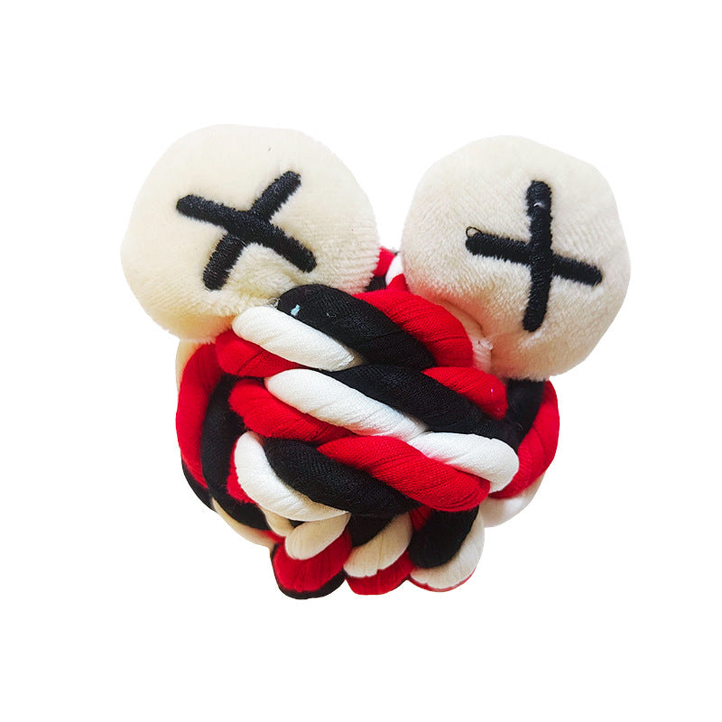 X Marks plush dog toy with cream appendages and black X marks, front view