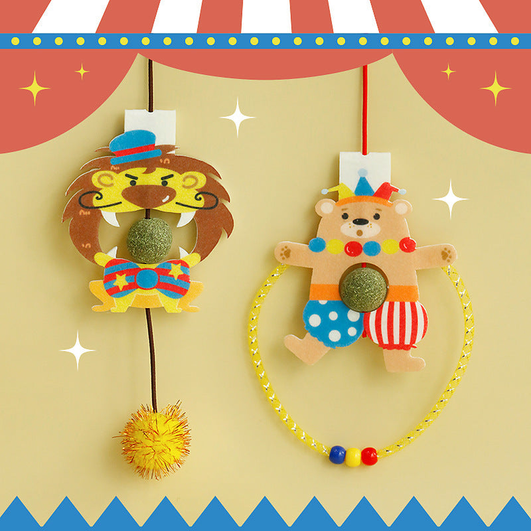 Lion and Clown Bear hanging cat toys with colorful character designs and central green balls.