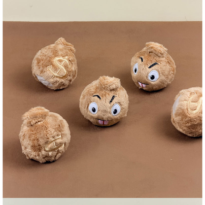 Brown money bag-shaped dog toys arranged upright to show face and dollar sign designs