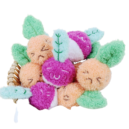 Fuzzy carrot- and radish-shaped dog toys arranged in a woven basket