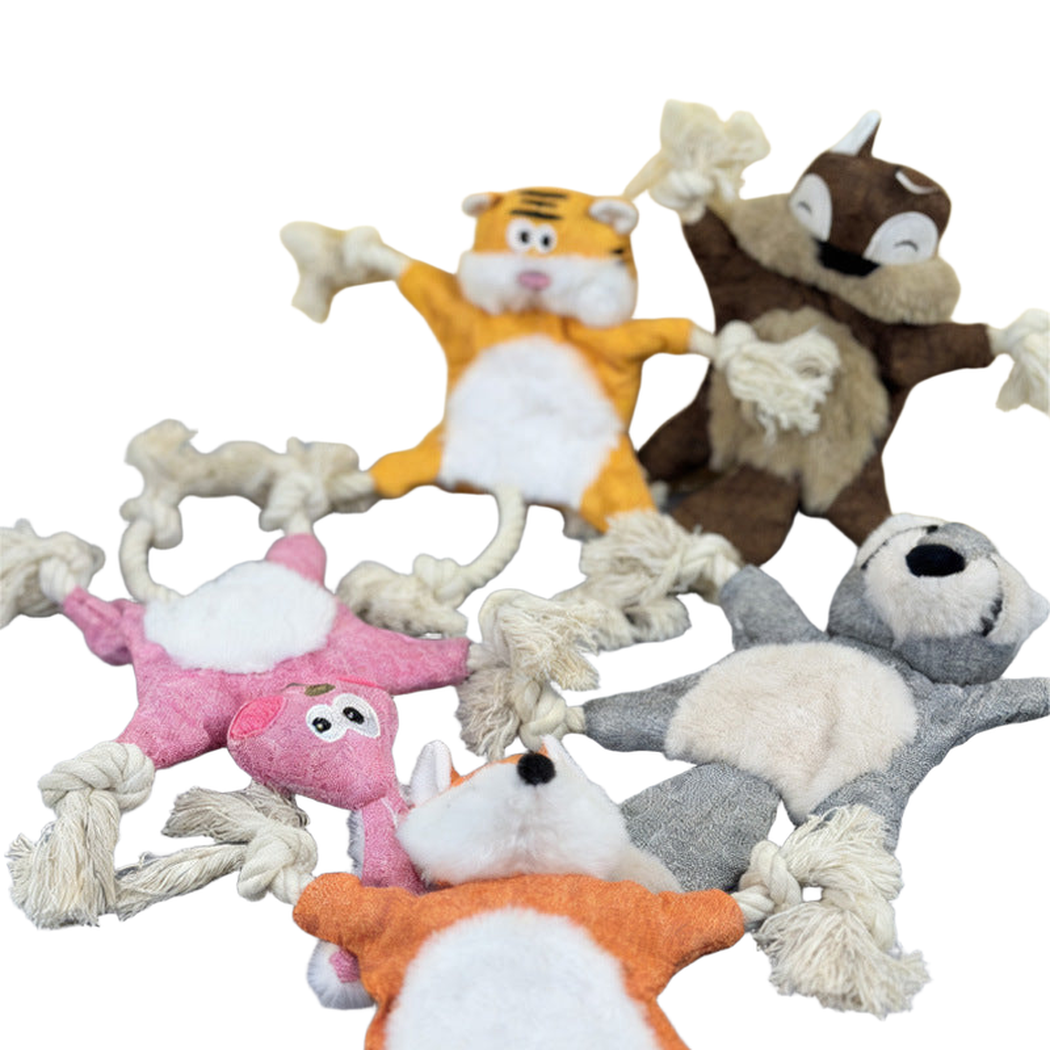 Fox, squirrel, raccoon, rabbit and tiger dog toys displayed together