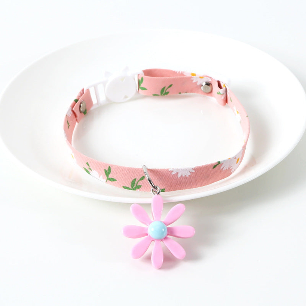 Pink daisy-print cat collar with pink flower charm
