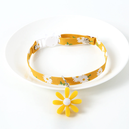 Mustard yellow daisy-print cat collar with yellow flower charm