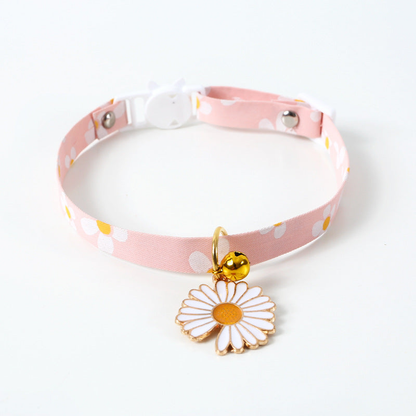 Pink daisy-print cat collar with white daisy charm and bell