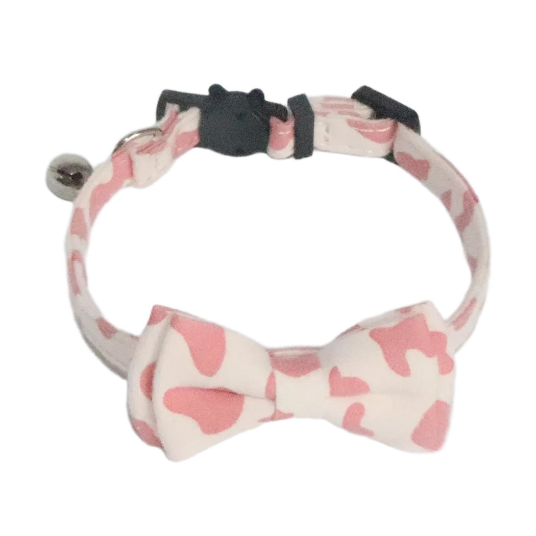 Light pink cow-print cat collar with bow tie and bell