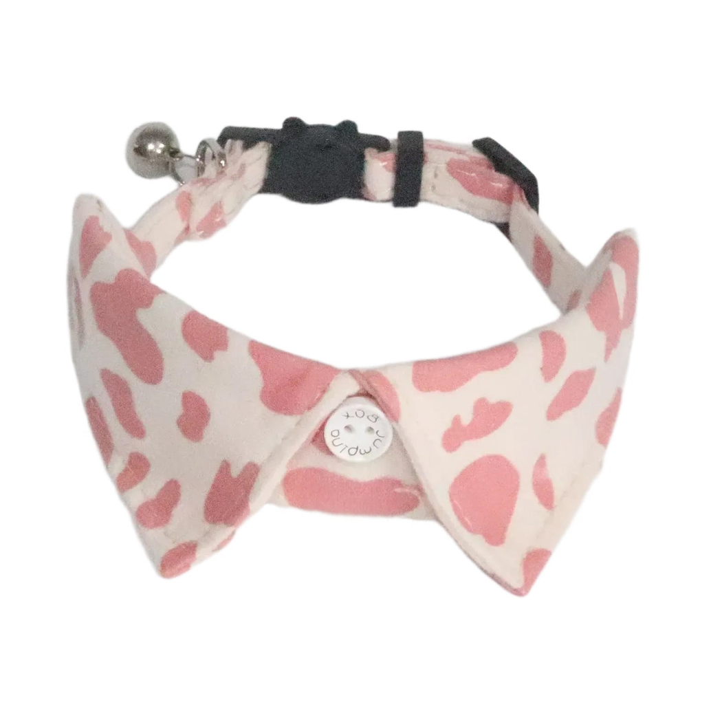 Light pink cow-print cat collar with pointed collar panels and bell