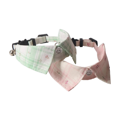 Mint and pink plaid pointed-collar cat collars arranged together