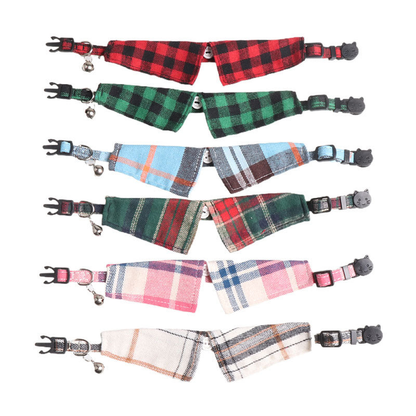 Six plaid bow cat collars laid flat with buckles, rings and bells visible